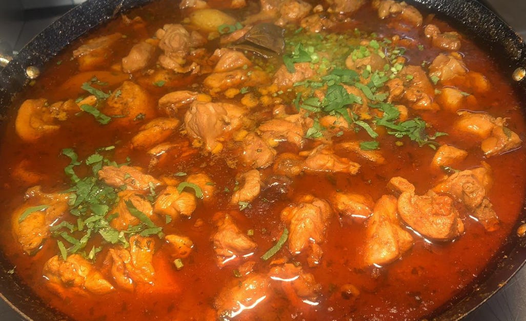 hot steaming curry broth 