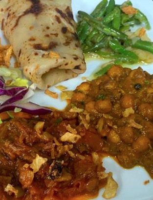 a mixed curry with wraps